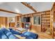 Inviting living room boasts a cozy fireplace, custom built-ins, and hardwood floors at 160 Bristlecone Way, Boulder, CO 80304