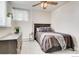 Cozy bedroom with plush carpeting, a large dresser, and a stylish ceiling fan at 2345 N Clay St # 6, Denver, CO 80211