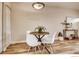 Dining area with hardwood floors and modern decor, bathed in natural light at 2345 N Clay St # 6, Denver, CO 80211
