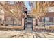 Charming brick condo building with secure gated entry and mature trees at 2345 N Clay St # 6, Denver, CO 80211