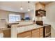 Kitchen area with granite countertops and stainless steel appliances and dining area at 2345 N Clay St # 6, Denver, CO 80211