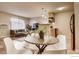Inviting living space with wood floors, open layout, and a decorative plant centerpiece at 2345 N Clay St # 6, Denver, CO 80211