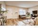 Cozy living room showcasing hardwood floors, natural light, and stylish decor at 2345 N Clay St # 6, Denver, CO 80211