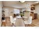 Bright living room with hardwood floors, modern furniture, and an open concept kitchen at 2345 N Clay St # 6, Denver, CO 80211