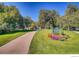 Jefferson Park entrance featuring sidewalk, green grass, flowers, and sign at 2345 N Clay St # 6, Denver, CO 80211