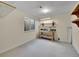 Unfinished basement with a workbench and storage shelves, perfect for a workshop or extra storage at 946 Champion Cir, Longmont, CO 80503