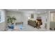 Spacious basement has a workout space, a sitting area, and light-colored carpet at 946 Champion Cir, Longmont, CO 80503