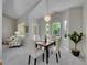 Bright dining area with a chandelier and views to the back yard at 946 Champion Cir, Longmont, CO 80503