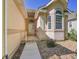 Inviting front entrance with manicured landscaping and a tiled walkway at 946 Champion Cir, Longmont, CO 80503