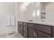 Elegant bathroom with double sinks, a large mirror, and a glass-enclosed shower for a spa-like experience at 2080 Alcott Way, Broomfield, CO 80023