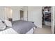 Spacious bedroom with a walk-in closet and attached bathroom, designed for comfort and convenience at 2080 Alcott Way, Broomfield, CO 80023