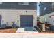 Exterior of home with garage door, landscaping, and visible address numbers at 2080 Alcott Way, Broomfield, CO 80023