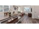 Inviting living room with stylish decor, hardwood floors, and plenty of natural light from windows at 2080 Alcott Way, Broomfield, CO 80023