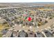 Aerial view of a home showcasing its position in a well-planned community with easy access to local amenities at 4884 St Vrain Rd, Firestone, CO 80504
