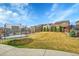 Spacious backyard featuring a well-maintained lawn and a trampoline at 4884 St Vrain Rd, Firestone, CO 80504