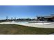 Community pool area with colorful water features and a modern clubhouse at 4884 St Vrain Rd, Firestone, CO 80504