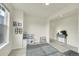 Inviting playroom featuring a kitchen, shelving, and neutral decor at 4884 St Vrain Rd, Firestone, CO 80504