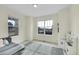 Bright play room with carpet and plenty of natural light at 4884 St Vrain Rd, Firestone, CO 80504
