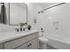Bright bathroom with white subway tile, matte black fixtures, and neutral vanity at 1136 Hillside Ln, Louisville, CO 80027