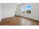 Bedroom featuring hardwood floors, natural light and bright white walls at 1136 Hillside Ln, Louisville, CO 80027