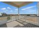 Expansive deck with white railings offering panoramic views of the surrounding community at 1136 Hillside Ln, Louisville, CO 80027