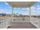 Stunning deck view overlooking neighboring homes and Colorado's picturesque landscape at 1136 Hillside Ln, Louisville, CO 80027