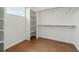 Spacious walk-in closet with custom shelves and ample storage, perfect for organization at 1136 Hillside Ln, Louisville, CO 80027
