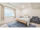 Comfortable bedroom featuring a full-sized bed, soft carpet, and neutral tones for a peaceful atmosphere at 6311 Stable View St, Castle Pines, CO 80108
