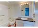 Cozy bathroom features a shower and tub combo and updated vanity with storage space at 3855 S Monaco St # 177, Denver, CO 80237