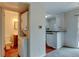 Functional space offering in-unit washer and dryer, next to kitchen with breakfast bar at 3855 S Monaco St # 177, Denver, CO 80237