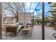 Outdoor patio with a large seating area including an outdoor sofa and overhead pergola at 4408 E 107Th Pl, Thornton, CO 80233