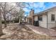 Backyard featuring outdoor patio and furniture with brick-lined walking path and a tree at 4408 E 107Th Pl, Thornton, CO 80233