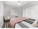 Bedroom features wood floors, ample storage and a neutral color palette to promote relaxation at 4408 E 107Th Pl, Thornton, CO 80233