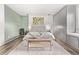 Bright bedroom with built-in storage, window seat, and modern design elements at 4408 E 107Th Pl, Thornton, CO 80233