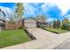 Charming single-Gathering home featuring a well-manicured lawn, concrete driveway and a two-car garage at 4408 E 107Th Pl, Thornton, CO 80233