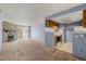 Inviting living room opens to kitchen and boasts a cozy fireplace with balcony access at 14182 E Colorado Dr # 204, Aurora, CO 80012