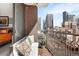 Relaxing balcony with comfortable seating and picturesque views of the city skyline at 1020 15Th St # 9K, Denver, CO 80202