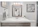 Bright bathroom showcasing a modern vanity, elegant mirror, and contemporary fixtures at 1020 15Th St # 9K, Denver, CO 80202
