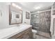 Modern bathroom featuring a sleek vanity, a frameless mirror, and a luxurious tiled shower at 1020 15Th St # 9K, Denver, CO 80202