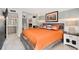 Cozy bedroom featuring a queen-sized bed, closet space, and modern decor at 1020 15Th St # 9K, Denver, CO 80202