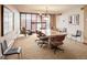 Bright conference room featuring a grand wood table and office chairs at 1020 15Th St # 9K, Denver, CO 80202