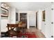 Warm dining space with a wooden table and cozy bench seating at 1020 15Th St # 9K, Denver, CO 80202