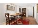 Charming dining area features wood table, bench seating, and stylish decor at 1020 15Th St # 9K, Denver, CO 80202