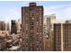 Tall brown apartment building with balconies and lots of windows in downtown area at 1020 15Th St # 9K, Denver, CO 80202