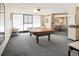Spacious recreation room featuring a pool table and an adjacent seating area at 1020 15Th St # 9K, Denver, CO 80202