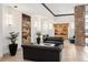 Elegant lobby area with leather sofas, stylish decor, and a welcoming atmosphere at 1020 15Th St # 9K, Denver, CO 80202