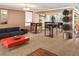 Inviting residential lounge area featuring high-top tables, barstools, and comfortable seating at 1020 15Th St # 9K, Denver, CO 80202
