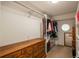 Walk-in closet with ample storage, including shelving and drawers, and hanging racks at 10696 Riverbrook Cir, Highlands Ranch, CO 80126