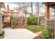 Back yard featuring garden, privacy fence, and concrete patio at 3719 W 30Th Ave, Denver, CO 80211