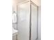 Bathroom with frosted glass enclosed shower, sink, and towel rack at 3719 W 30Th Ave, Denver, CO 80211